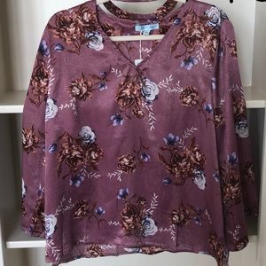 Floral stain top with neck cut out
